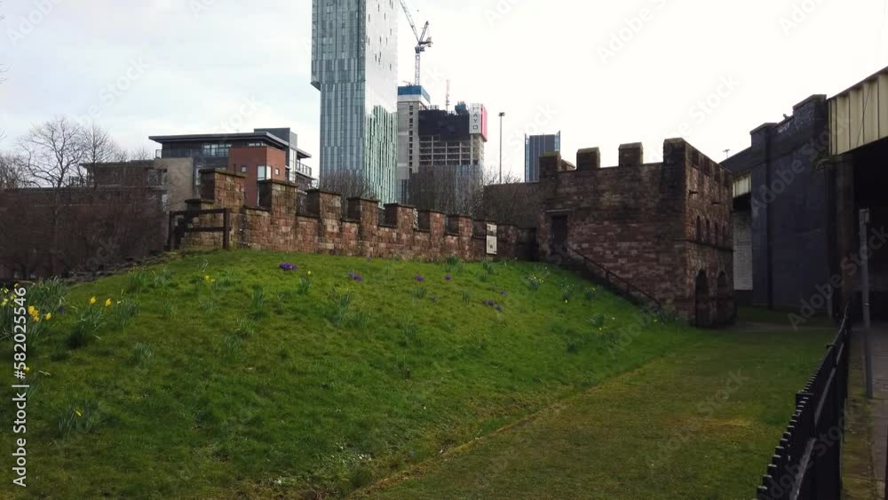 Mamucium or Mancunium remains of and recreation of a Roman fort in the Castlefield area of Manchester in North West England, UK showing the Betham Tower in the background Mamucium or Mancunium remains of and recreation of a Roman fort in the Castlefield area of Manchester in North West England, UK showing the Betham Tower in the background