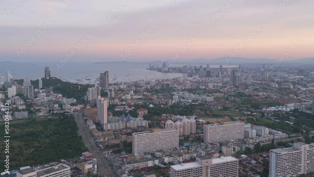 Aerial view of Pattaya sea, beach in Thailand in summer season, urban city with blue sky for travel background. Chon buri skyline. Aerial view of Pattaya sea, beach in Thailand in summer season, urban city with blue sky for travel background. Chon buri skyline.
