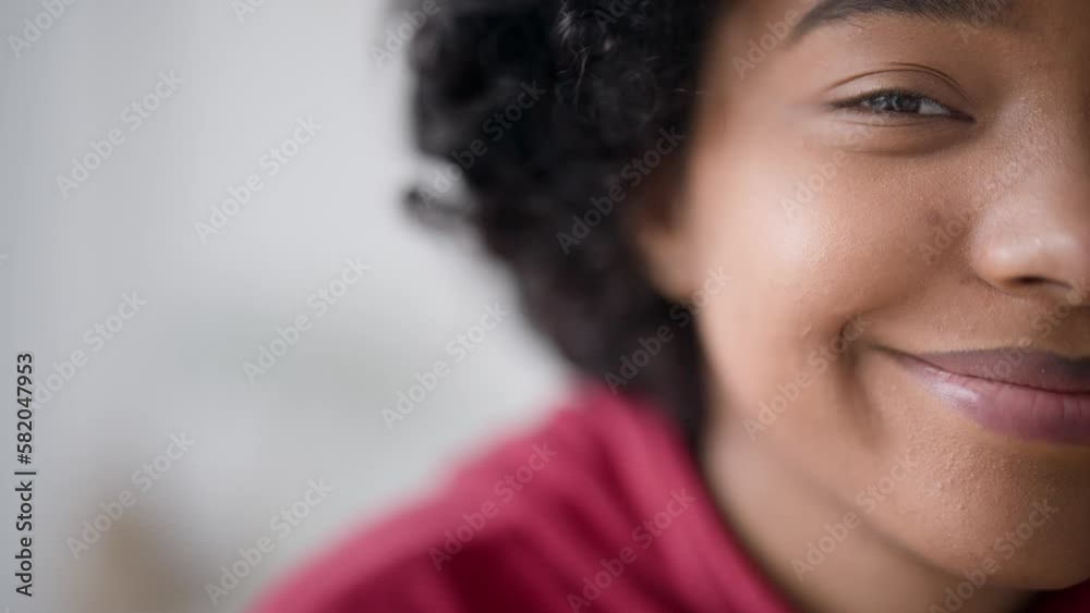 Close up portrait half face young beautiful african american woman ...