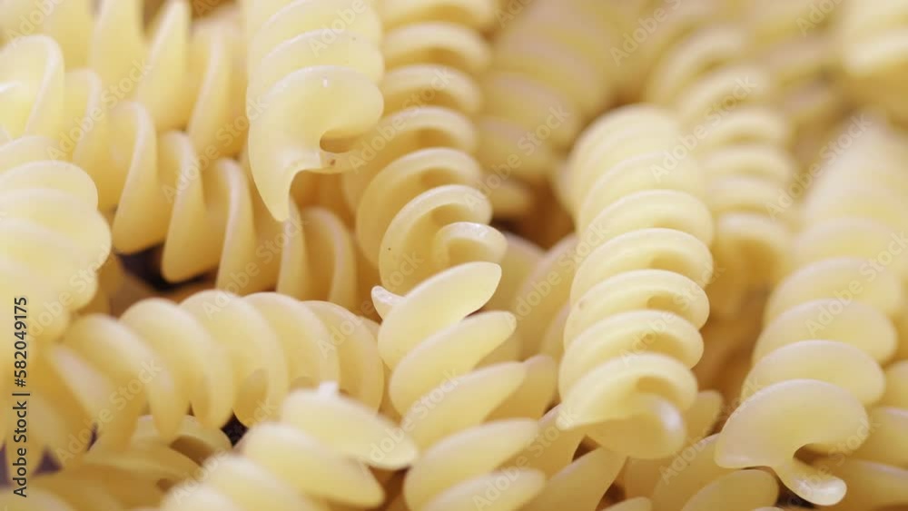 twisted pasta rotates in a circle. side view twisted pasta rotates in a circle. side view