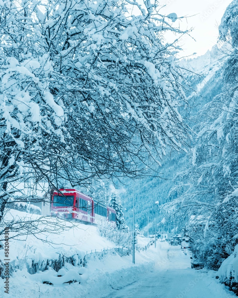 Red Train in Snowy Mountains in Chamonix, France Red Train in Snowy Mountains in Chamonix, France