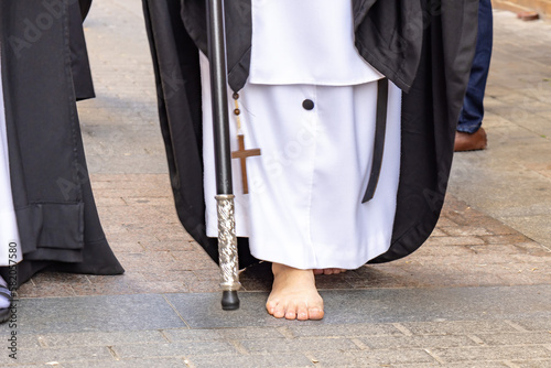 Detail of the bare foot of a nazarene or penitent doing his penance station in the Holy Week procession