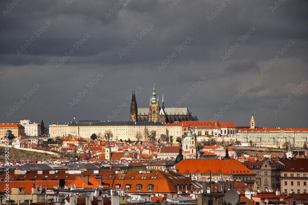 View from Vysehrad to Prague Castle over city in stormy time. Prague.