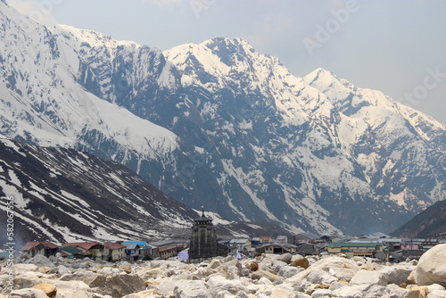 Kedarnath temple in the scenario of Kedarnath tragedy in 2013. Kedarnath Mandir is a Hindu temple dedicated to Shiva. Located on the Garhwal Himalayan range near the Mandakini river, photo