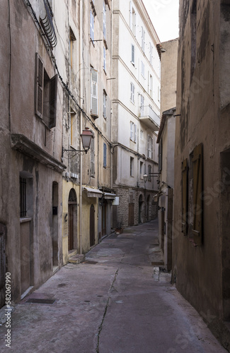 Beautiful narrow streets of Bonifacio in Corsica during summer © NomadPhotoReference