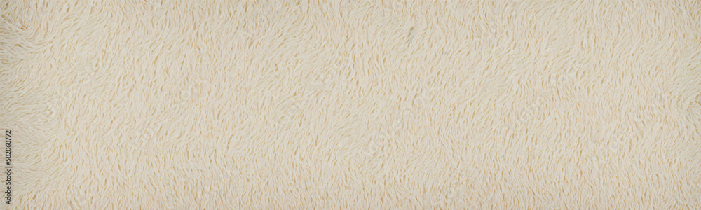 Cozy cream fleece blanket with subtle pattern and delicate wave design in beige. Perfect as spread or throw in hotel or home. Vector