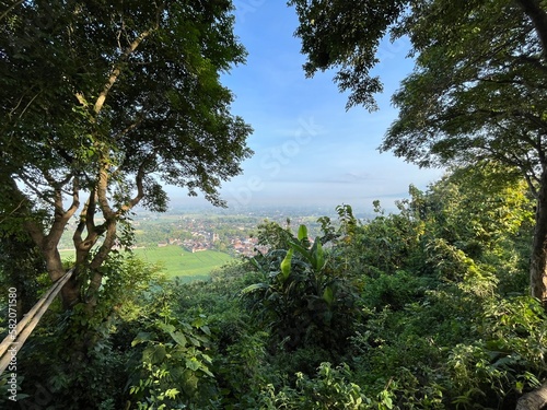 Beautiful aerial view from the top of Indrokilo Hills which is one of tourism destination in Yogyakarta, Indonesia. Photo shows established communities and nature.
