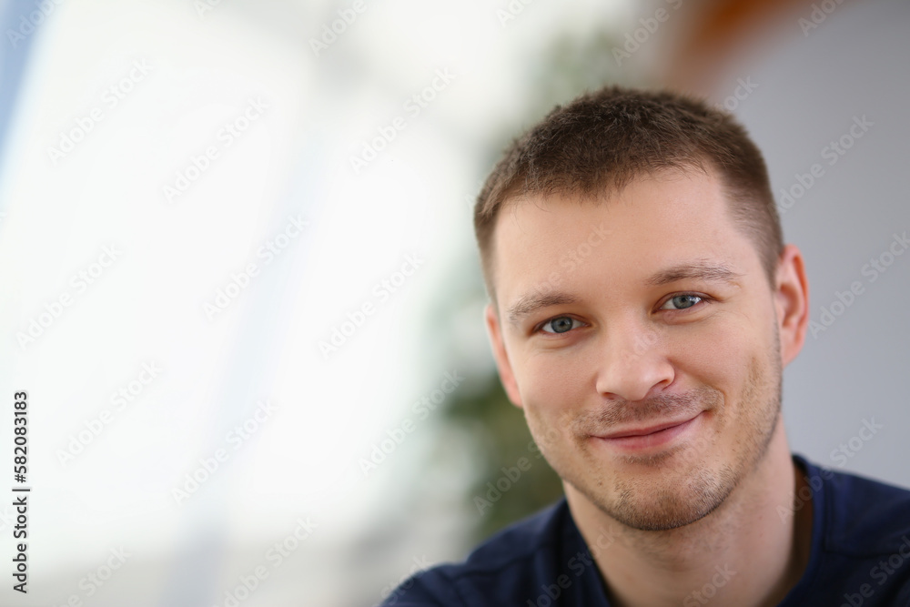 Portrait of handsome smiling young man with stubble Portrait of handsome smiling young man with stubble