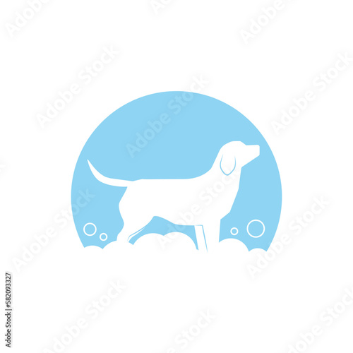 Blue dog logo during grooming with soap suds