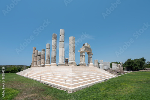 apollo temple stairs and pillars accompanied by blue sky and green grass ground