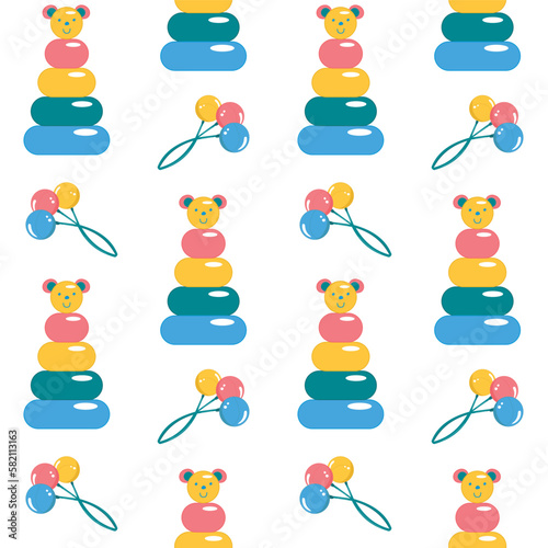 Seamless pattern with children s toy colored pyramid in the shape of a cone and colored rattle on a white background. 