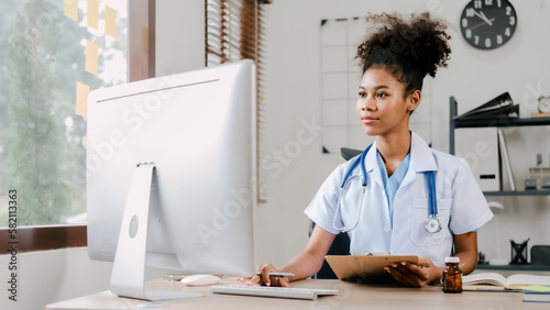 Young happy african american general practitioner therapist online consult with private practice.