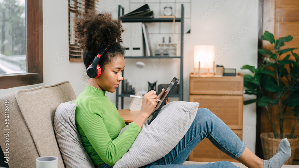 Pretty african american girl feeling fatigue lounge at sofa, happy calm lady dream enjoy wellbeing breathing fresh air in summer free time holiday. Pretty african american girl feeling fatigue lounge at sofa, happy calm lady dream enjoy wellbeing breathing fresh air in summer free time holiday.