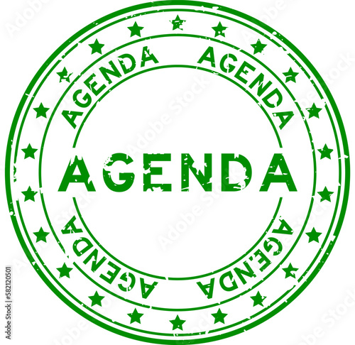 Grunge green agenda word round rubber seal stamp on white background
