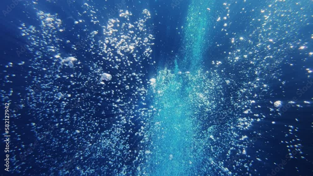 Air bubbles and sun rays under water, 4k Air bubbles and sun rays under water, 4k