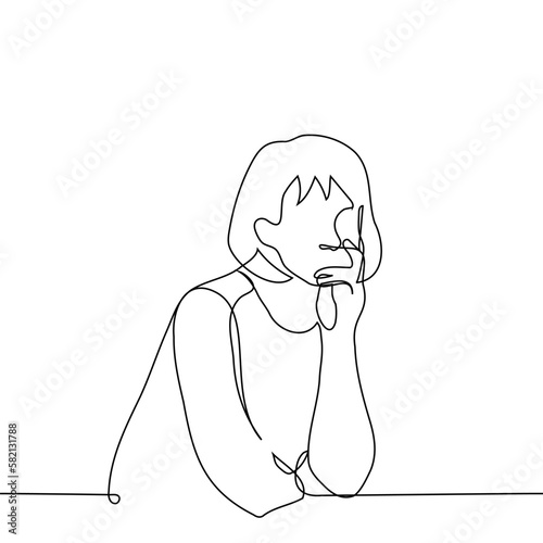 woman sits leaning her chin on his palm thinking - one line drawing vector. concept reflection, introspection
