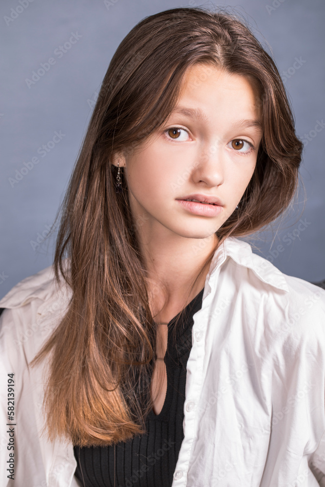 Studio portrait of a young teen girl Studio portrait of a young teen girl