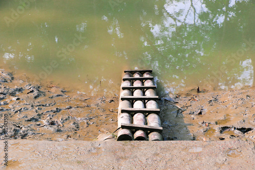 Wooden Ghat in the Pond in the Village - Barishal, bangladesh photo