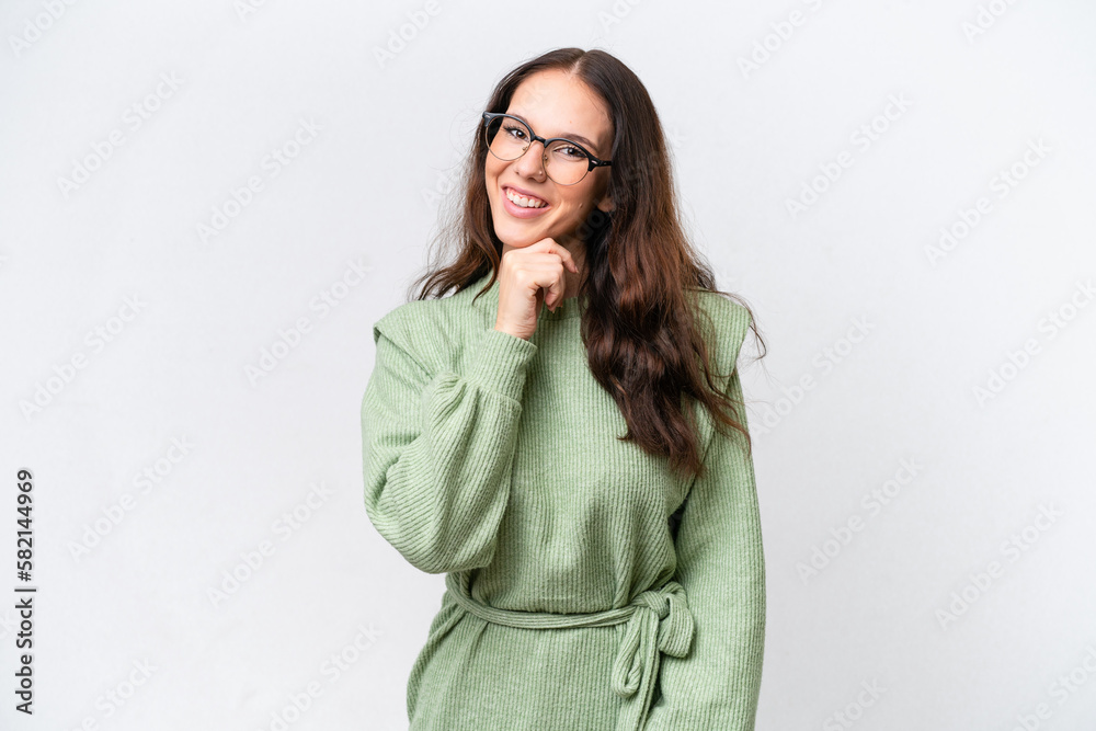 Young caucasian woman isolated on white background with glasses and smiling