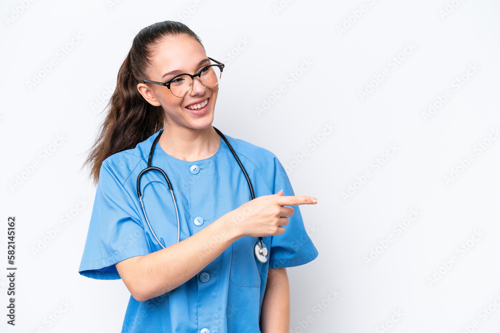 Young caucasian surgeon doctor woman isolated on white background pointing finger to the side and presenting a product Young caucasian surgeon doctor woman isolated on white background pointing finger to the side and presenting a product
