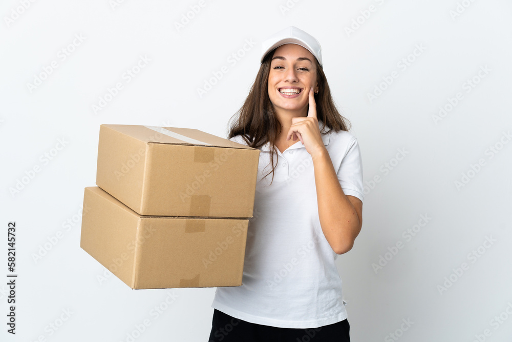 Young delivery woman over isolated white background smiling with a happy and pleasant expression