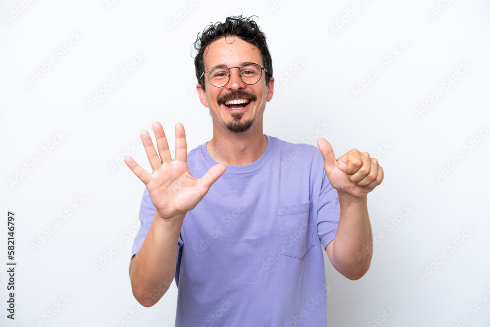 Young man with moustache isolated on white background counting six with fingers