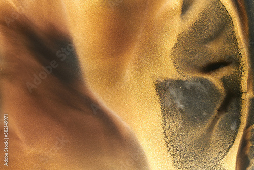 Luxury abstract background, liquid art. Black gold paint mix, alcohol ink blots, marble texture. Modern print pattern