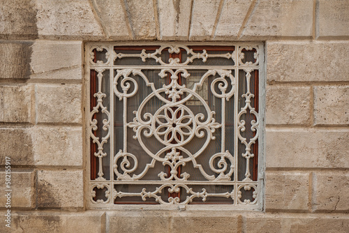 Old wall with ancient decorative pattern lattice window background