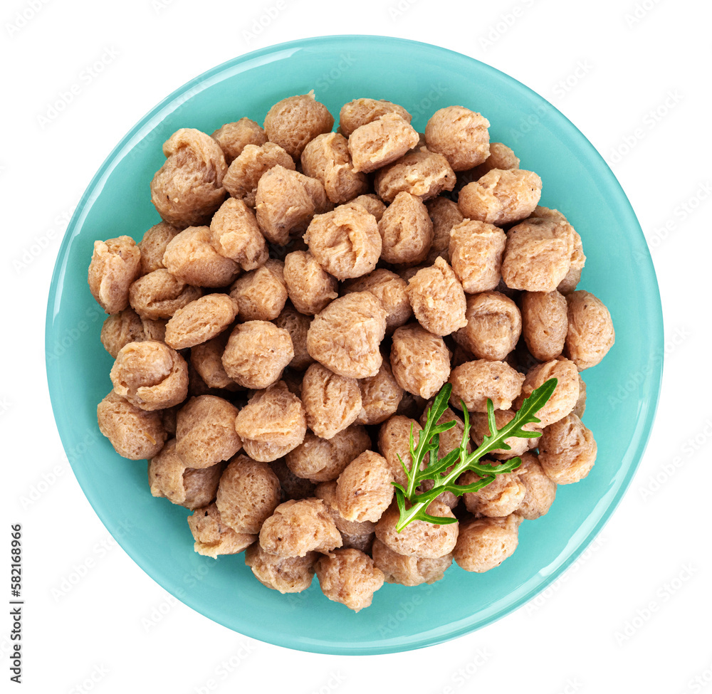 Soy meat in a plate isolated on white background. Vegan meat. Top view. Soy meat in a plate isolated on white background. Vegan meat. Top view.