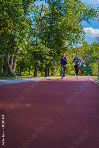 Wallpaper Mural Young couple running Torontodigital.ca