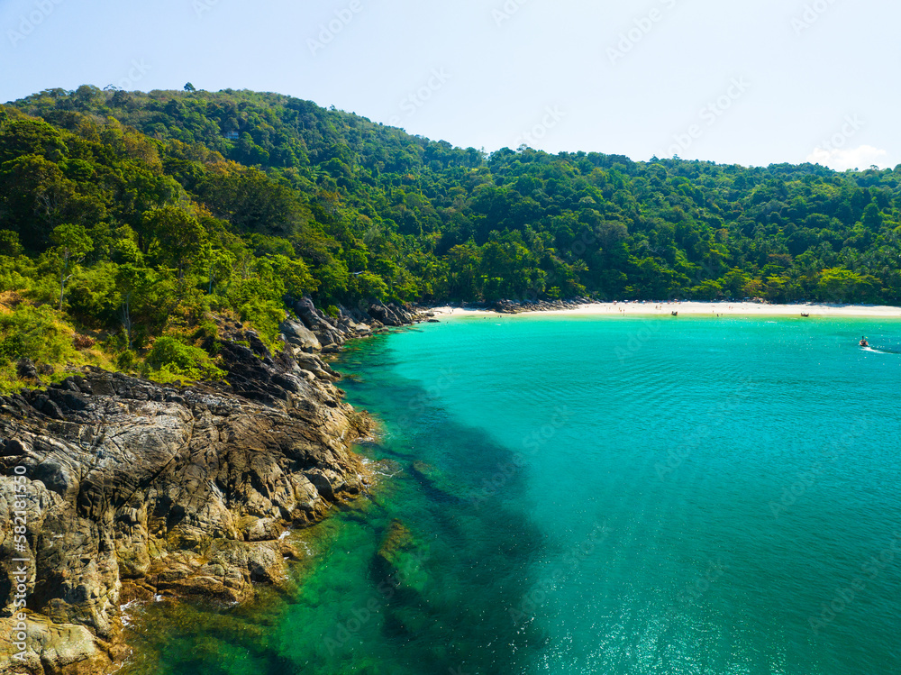 Obraz premium Amazing top view beach Aerial view of Tropical beach sea in the beautiful Phuket island Located at Freedom beach Phuket Thailand