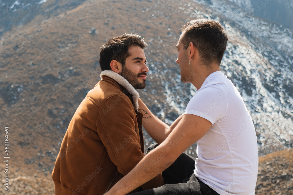 Loving couple in front of mountains Loving couple in front of mountains