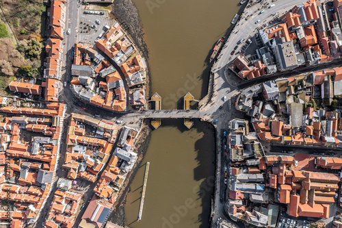 Aerial view directly above the Yorkshire coastal town of Whitby photo