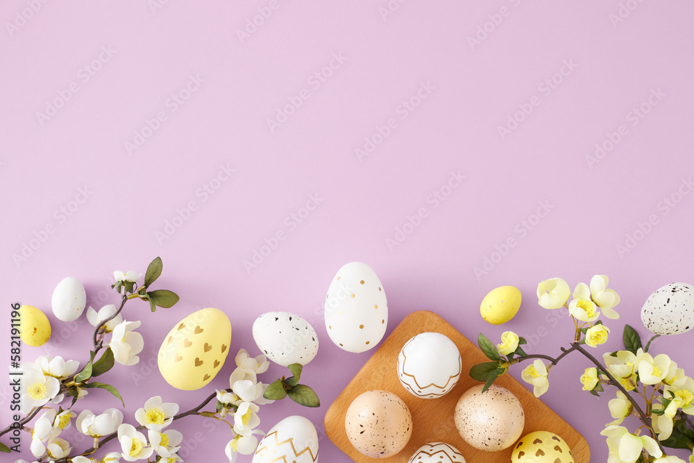 Easter celebration idea. Flat lay photo of white yellow and golden easter eggs in wooden holder and spring blossom flowers on pastel violet background with copyspace