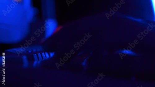 Close up of hands typing on a retro keyboard from 90s 00s computer. Old technology concept. Typing on old computer