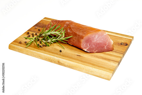 Картината върху платно sliced and smoked sirloin on wooden board with pepper