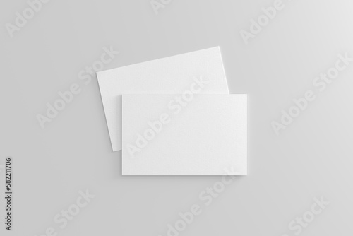 Business card mockup. Pair of business card on white background. View directly above