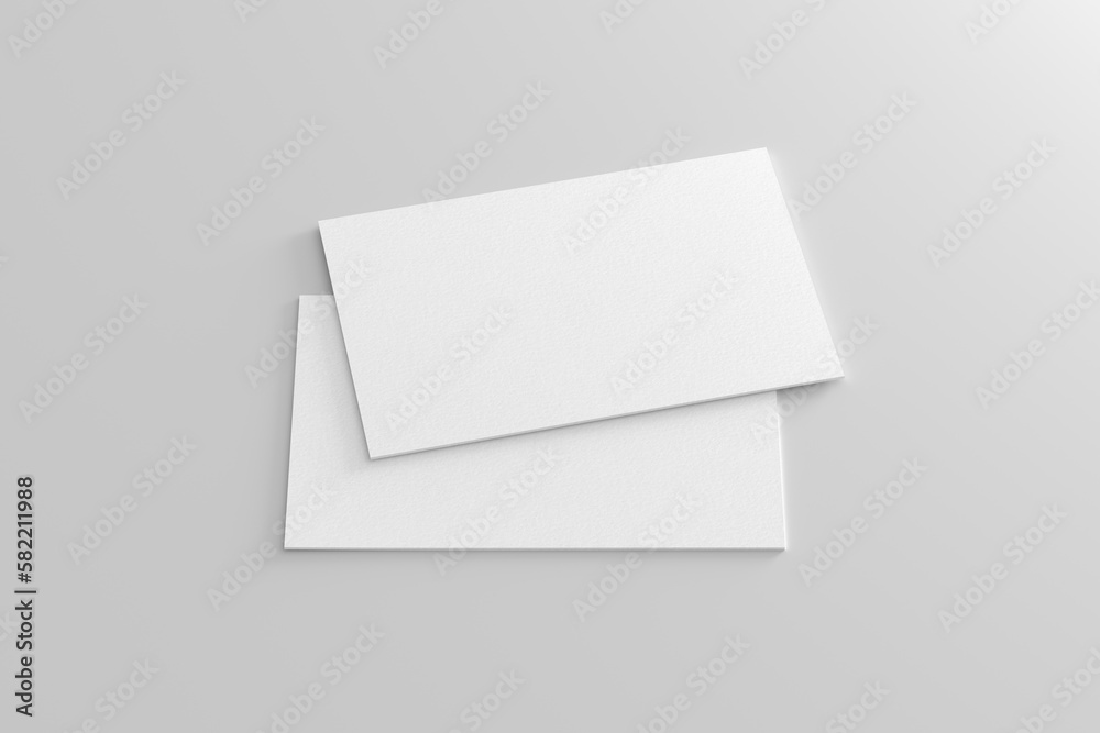 Business card mockup. Pair of business card on white background. Side view Business card mockup. Pair of business card on white background. Side view