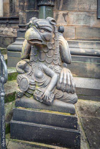 Eagle with a woman sculpture in front of Bremen Cathedral - Bremen, Germany