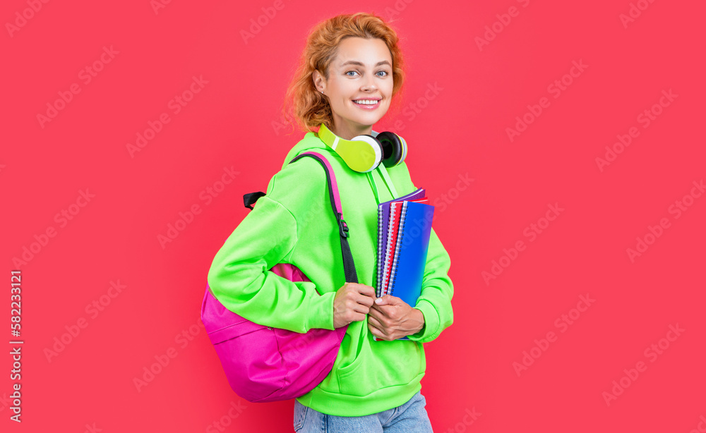 smiling school woman education isolated on red background. school woman education smiling school woman education isolated on red background. school woman education