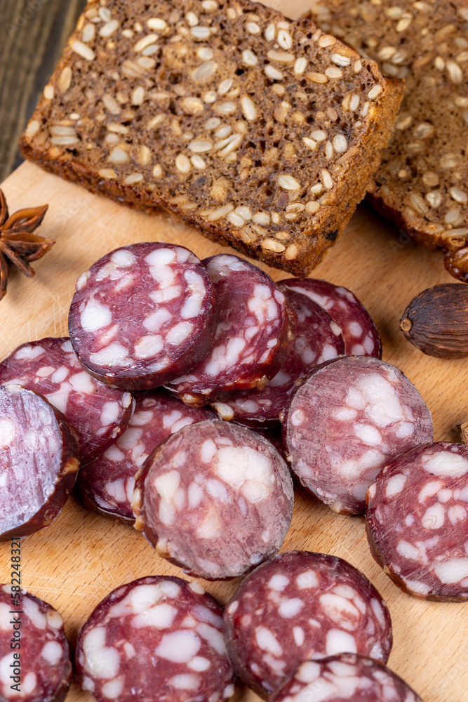 sliced high-quality pork sausage with the addition of lard pieces sliced high-quality pork sausage with the addition of lard pieces