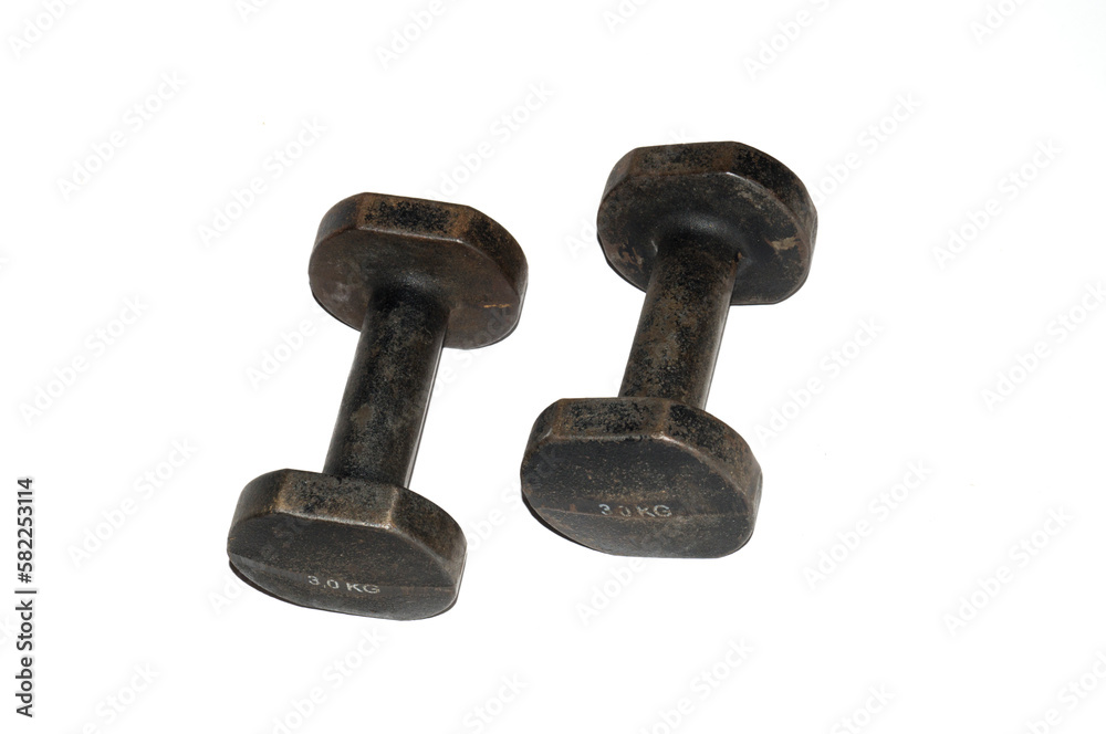 pair of used metal dumbbells for physical exercise pair of used metal dumbbells for physical exercise