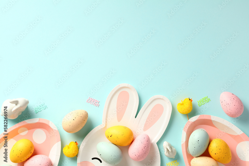 Happy Easter greeting card template. Frame border made of Easter eggs, plates, decoration on blue background.