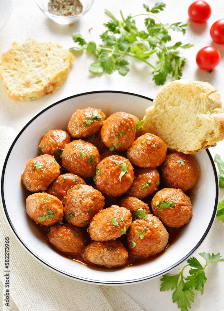 Meatballs with tomato sauce in bowl Meatballs with tomato sauce in bowl