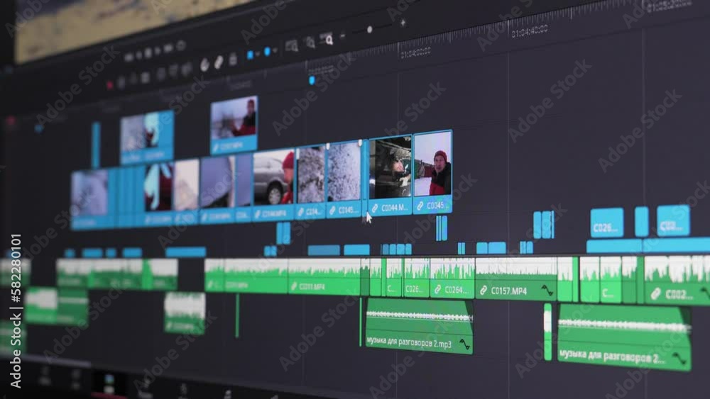 Close up of video editing time line and computer monitor as video editor works on edit Video editing on computer. fix work of program for video editing, video processing, post-production, clip maker