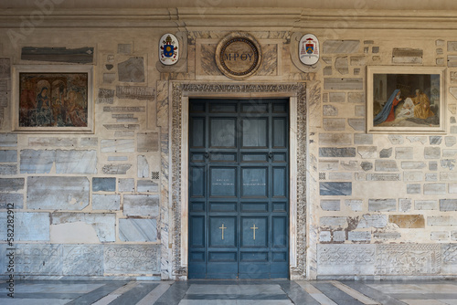 Entrance door to the Basilica di Santa Maria in Trastevere, romanesque styled church in Trastevere, Rome  © Paolo