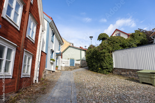 Rustic houses and street in old part of Ronneby, Sweden photo