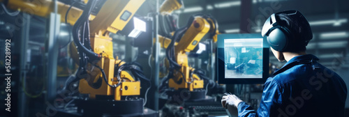 In an intelligent factory for the automotive industrial sectors, welding robotics automatic arms machines are under engineer control and monitoring. Industry 4.0 digital manufacturing - Generative AI