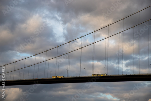 bridge photo with dramatic clouds background , geometric shaped bridge figure and Bosphorus bridge, transportation concept © ERDAL SEKER