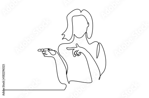 beautiful young woman showing with index fingers
